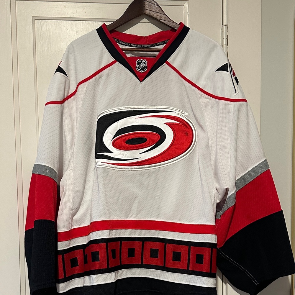 Carolina Hurricanes RBK Hockey Goalie Jersey with Red and Black Accents